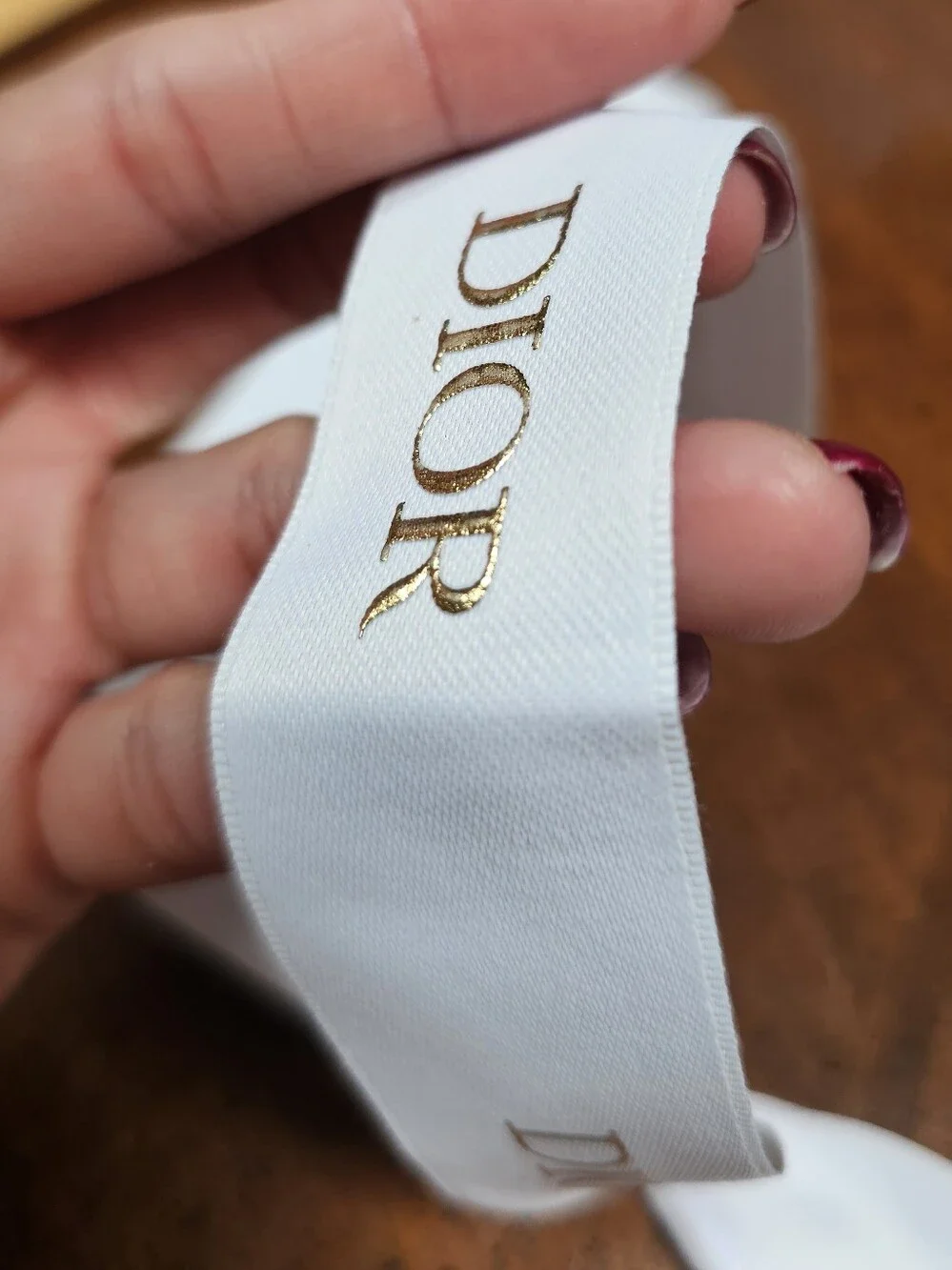 Dior White Ribbon Bow with Gold Logo